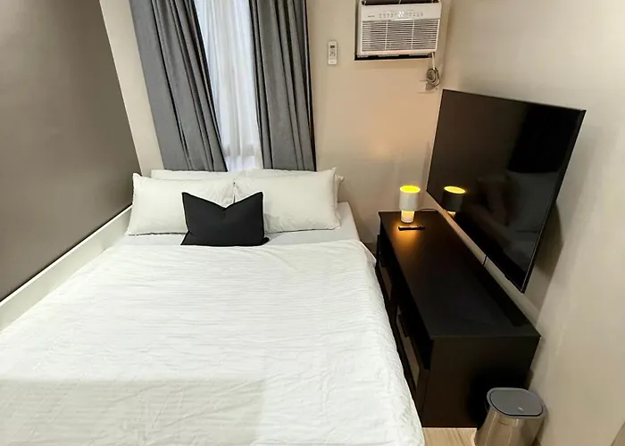The Qc In Quezon City, *
